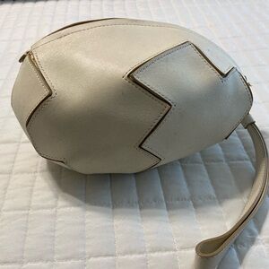 Moschino egg-shaped leather mini bag with a wristlet strap